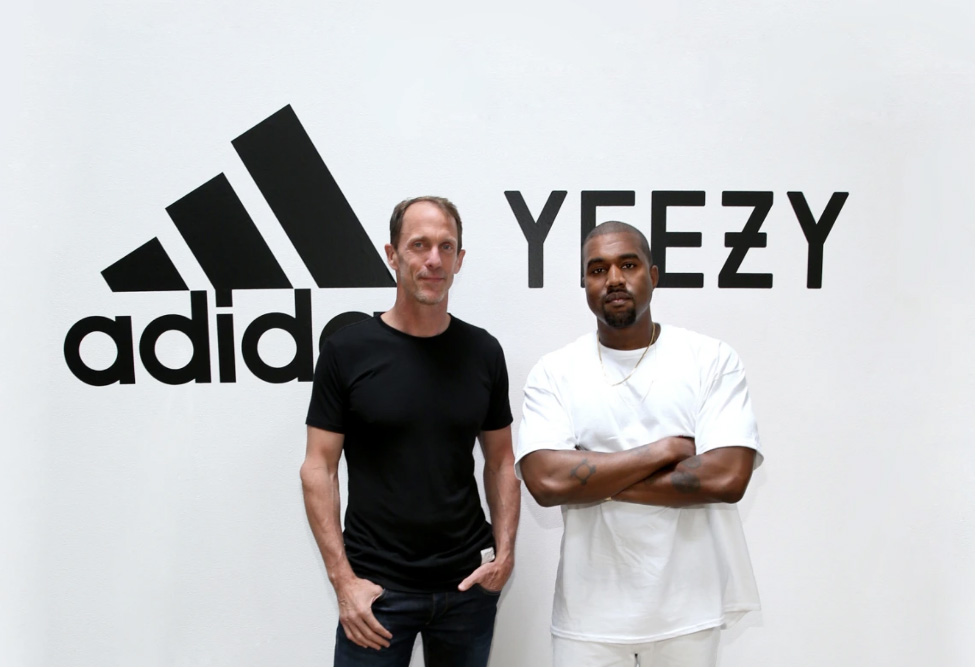 Kanye West with the president of Adidas