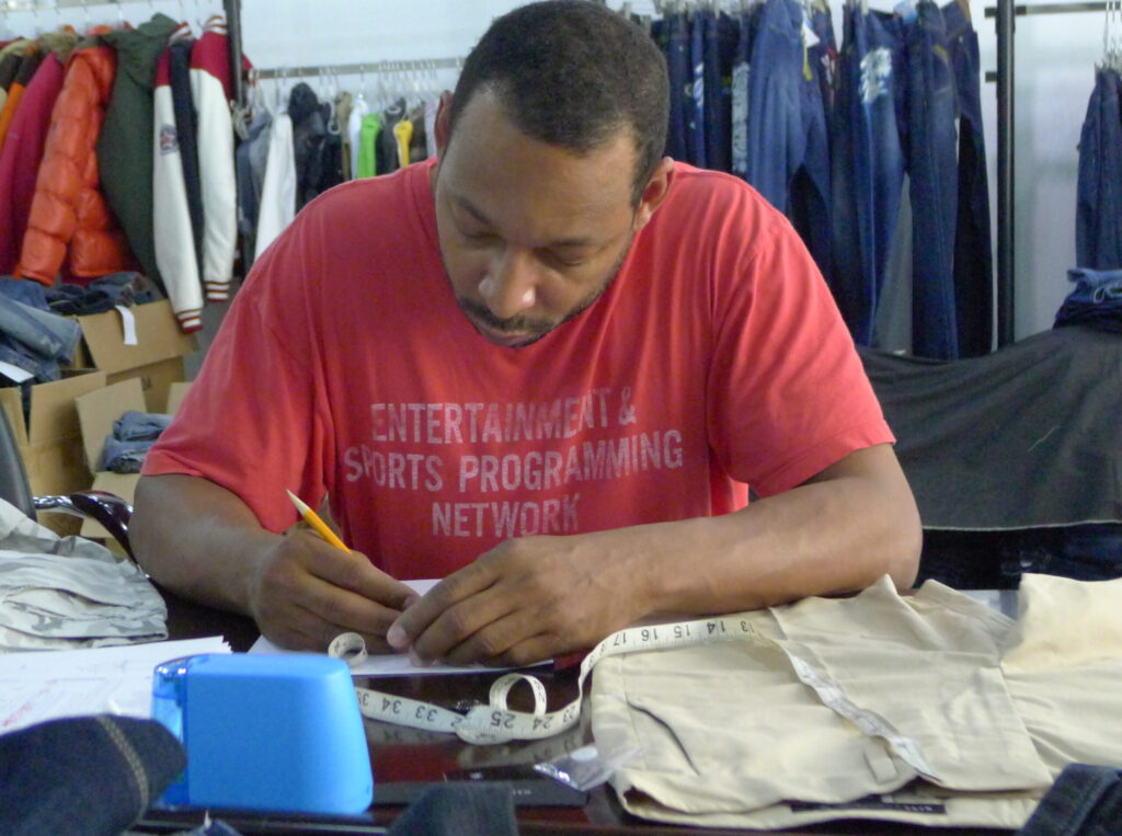 Maurice Malone designing in a factory in China