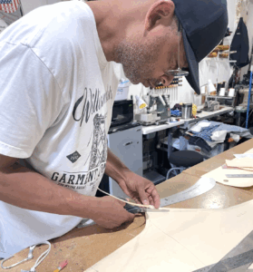 Maurice Malone working in his factory in Williamsburg, Brooklyn