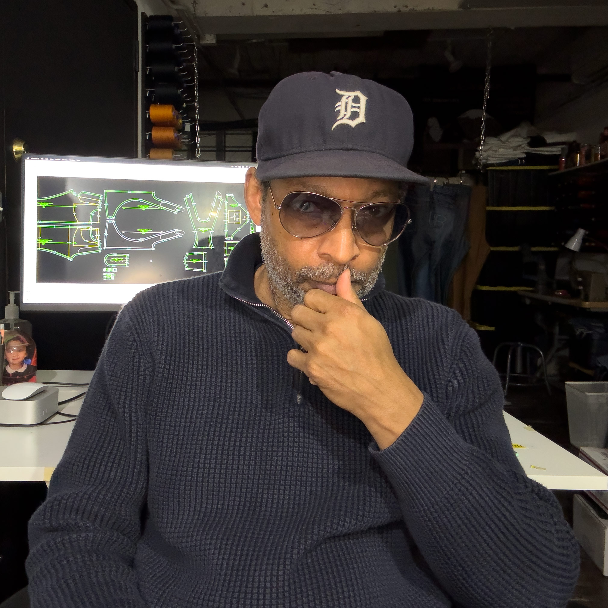 Maurice Malone in Brooklyn studio with digital jean pattern on screen promoting Denim Talk online denim meetup, with Making A Brand, and Williamsburg Garment Company.